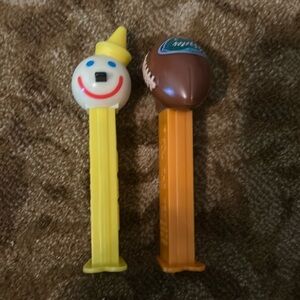2 Pez dispensers. Florida Gators and Jack in the Box